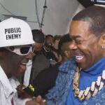 Watch Flavor Flav Lose It When He Sees ‘Rap God’ Busta Rhymes at VMAs Backstage (Exclusive)