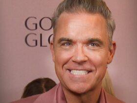 Robbie Williams Shows Off ‘Brand-New Teeth’ He Got Ahead of 2025 Golden Globes (Exclusive)